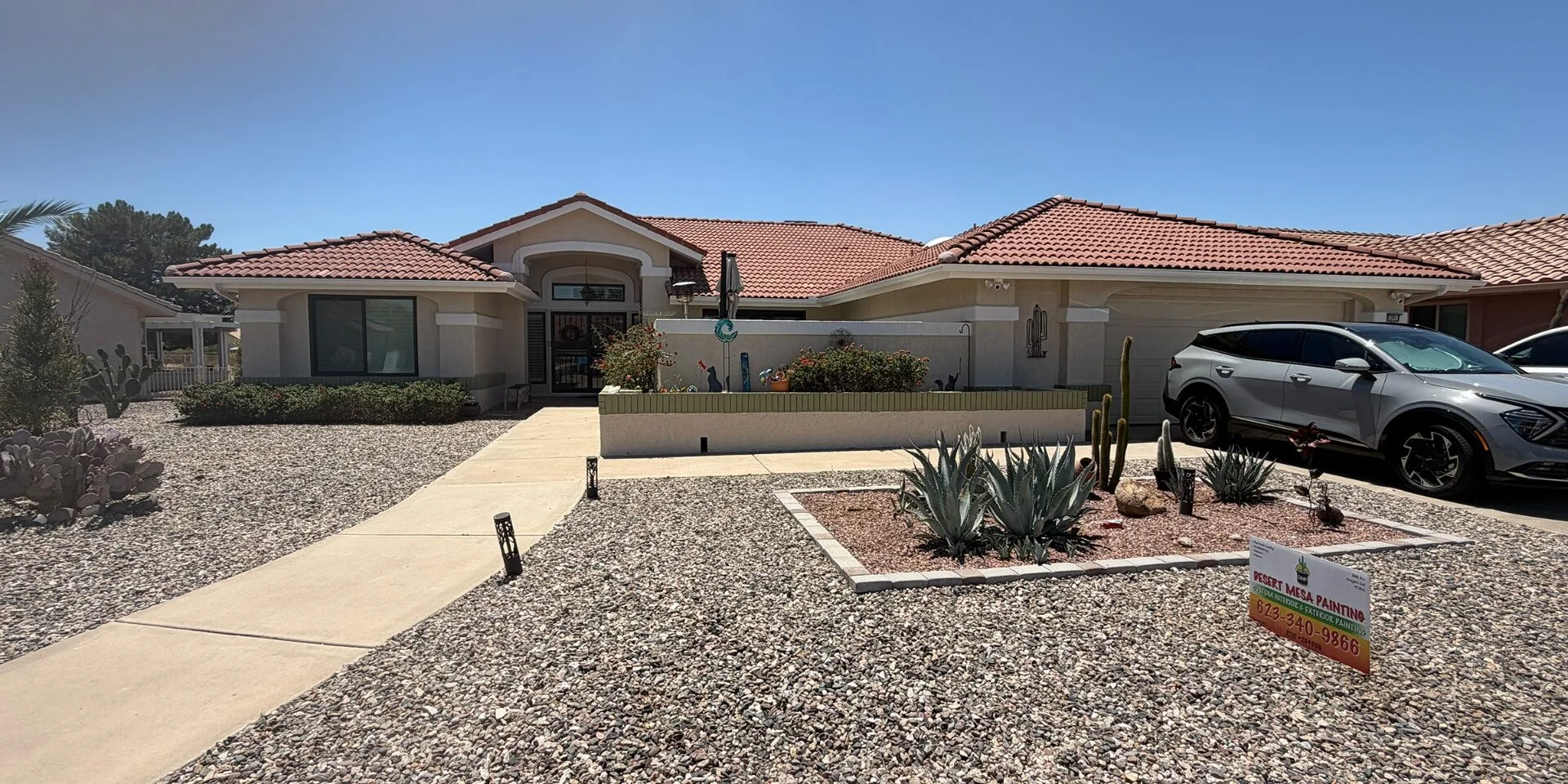 Two-tone stucco and trim exterior repaint with elastomeric coatings in the West Valley, AZ