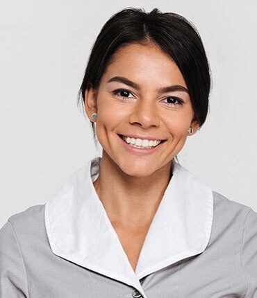 Smiling woman in professional attire representing Desert Mesa Painting's team, emphasizing quality craftsmanship and customer satisfaction.